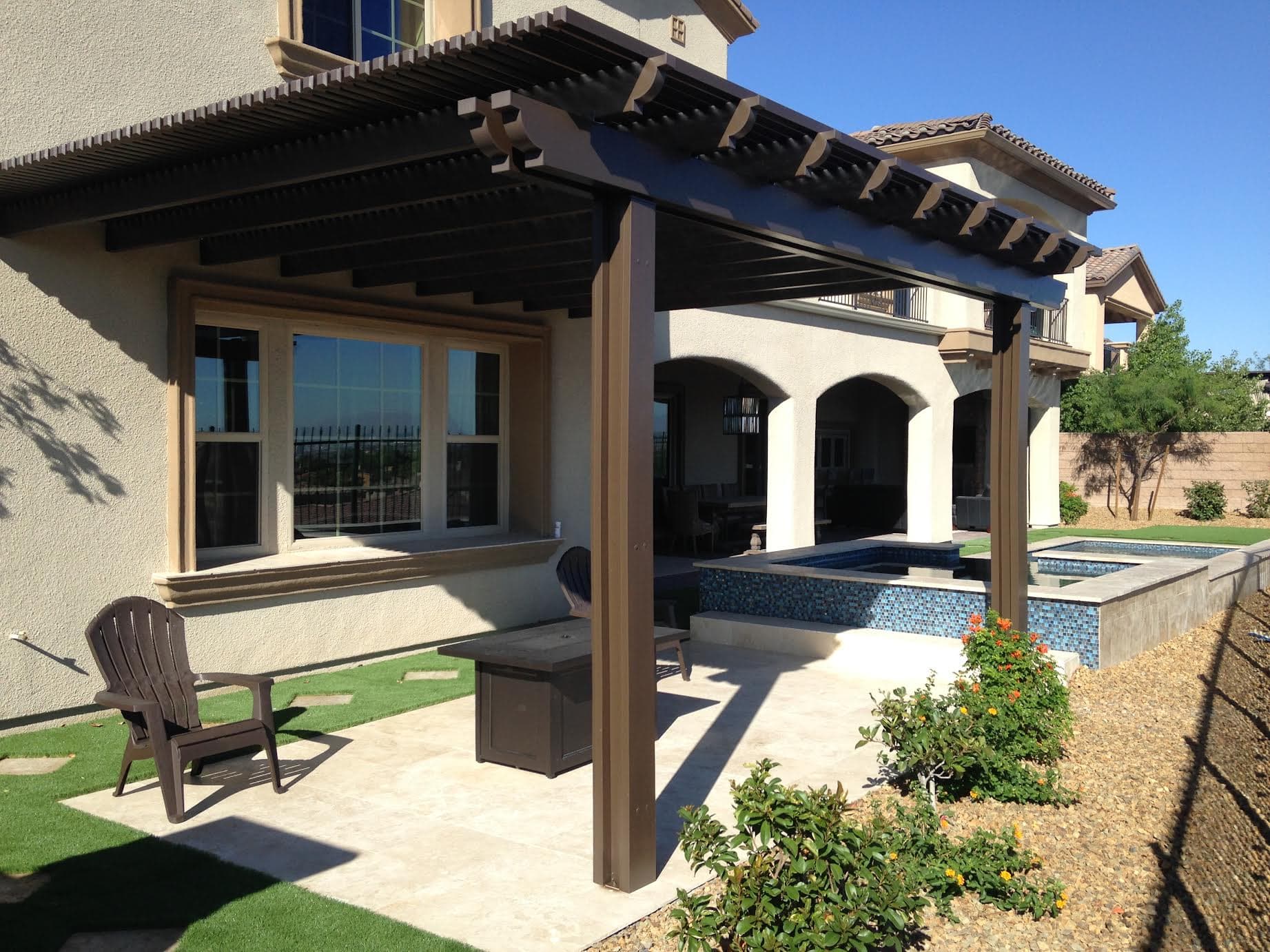 Dark-brown Alumawood combo patio cover over an outdoor kitchen and pool